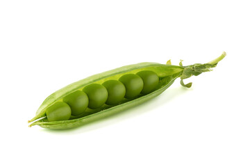 Close up of ripe green peas inside the pod.