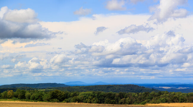 Blue sky with Comulus clouds over valley of river Main in Upper Franconia in Bavaria