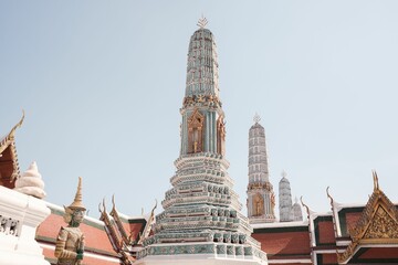 Closeup of Phra Asada Maha Chedi under the blue sky in Bangkok