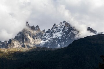 Landscape of an alpine mountain range covered in the snow in the countryside