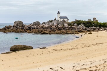 Lighthouse surrounded by greenery in Bretagne, France