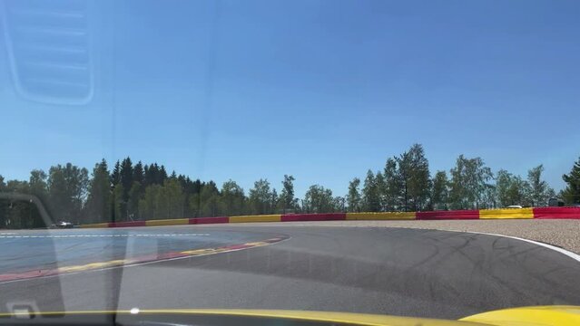 Ride in the Porsche GT4 race car over track section 2 of Circuit Spa Francorchamps from Kemmel Straight through curves Le Combs and Malmedy, tight bend Bruxelles to exit curve Pouhon, FIA Formula 1
