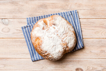 Fresh homemade crisp round bread on napkin, top view. Healthy unleavened bread. French bread. Top view Bakery products