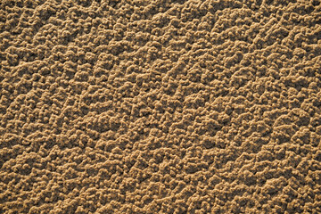 a sandy texture background. Drought on land in Earth