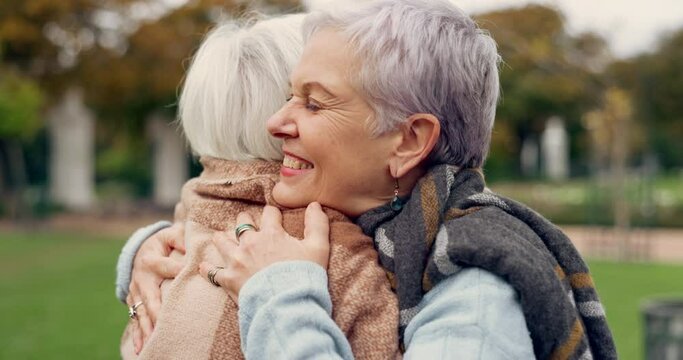 Love, connection and elderly women hug for affection, romance and bonding on an outdoor date. Nature, commitment and senior female couple in retirement with intimate moment in a green garden or park.