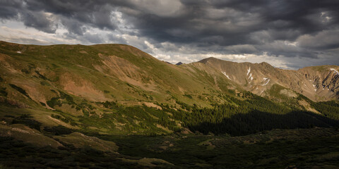 Fototapeta na wymiar Golden hour storms form over Loveland Pass in Summit County, Colorado