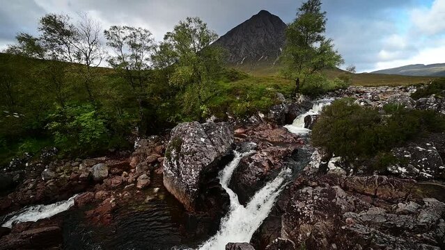Waterfalls in front of mountain range Buachaille Etive Mor, Glen Coe, Scotland, Great Britain