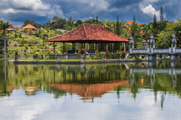 Fototapeta na wymiar Water Palace Taman Ujung in Bali. Balinese architecture with water
