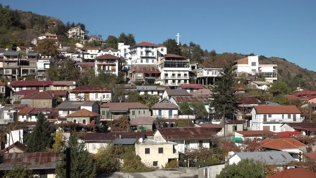 Religious cross on top of a hill in Pedoulas village in the Troodos mountains, Cyprus
