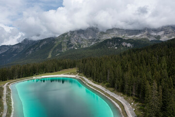 perspective aerial view of the Montagnoli lake in Trentino
