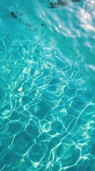 Fototapeta na wymiar A pool with clear blue water and ripples. Digital image. Abstract water texture