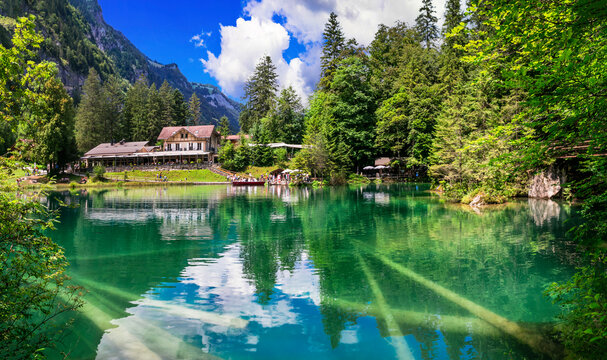 amazing Swiss ountain lakes - beautiful fairytale Blausee lake with clear trasparen waters. near Kandersteg village. Switzerland  travel and scenery