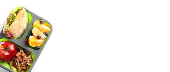 Lunchbox with delicious food on white background with space for text