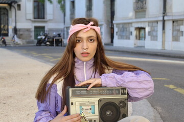 Girl listening to music in the 1980s 