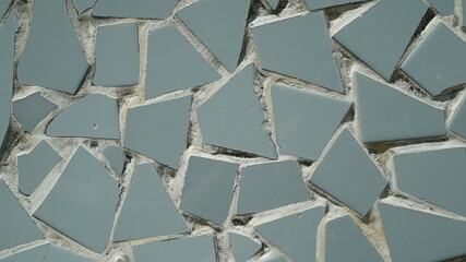 Gray polygon shaped wall tile texture background