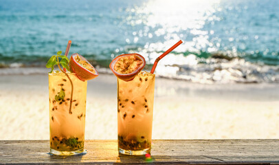 two drinks with passionfruit decoration