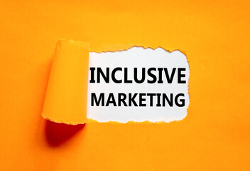 Inclusive marketing symbol. Concept words Inclusive marketing on beautiful white paper. Beautiful orange background. Business inclusive marketing concept. Copy space.
