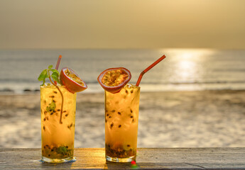 two drinks with passionfruit decoration - obrazy, fototapety, plakaty