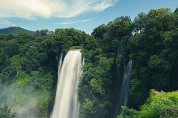 Naklejka premium panoramic view of the Marmore waterfalls, the highest in Europe, in the Umbria region in the province of Terni. They give a sense of power, peace and freshness