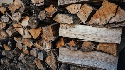 Zelfklevend Fotobehang stacked firewood © carlos
