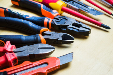 Different types of tools screwdrivers, pliers, nippers.