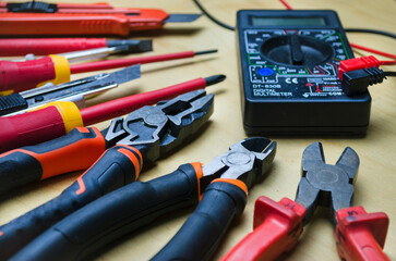 Different types of tools screwdrivers, pliers, nippers.