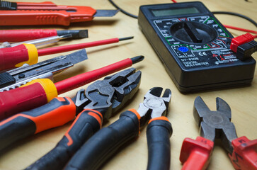 Different types of tools screwdrivers, pliers, nippers.