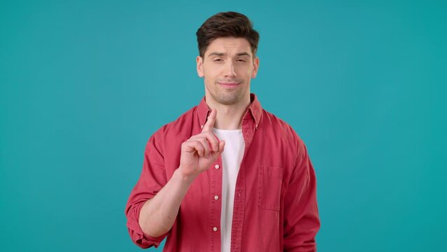 Man shakes index finger in denial and stubbornly refuses