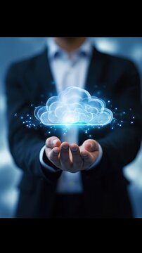 Man holding virtual cloud computing in hand concept.