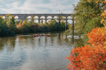 Railway Bridge with river in Bietigheim-Bissingen, Germany. Autumn. Railway viaduct over the Enz...