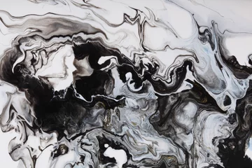 Zelfklevend Fotobehang Art Abstract flow pour acrylic, ink and watercolor marble painting. Black and white color wave texture blots background. © Liliia