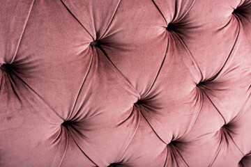 soft textile upholstery with buttons, closeup shot element