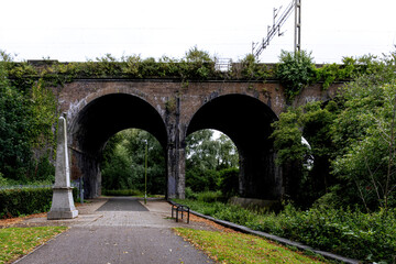 Railway bridge with arches going over the river over in watford