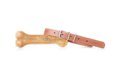 Leather pet collar and chew bone on white background