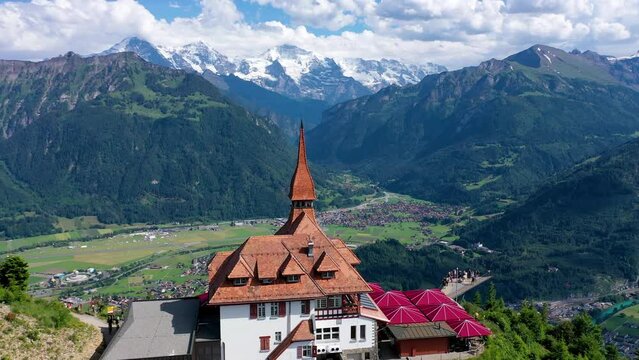 Flying over Harder Kulm with Interlaken city view