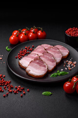 Delicious smoked bacon with salt, spices and herbs