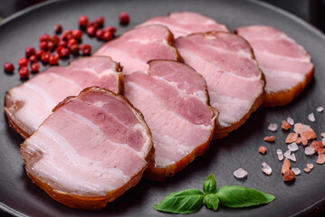 Delicious smoked bacon with salt, spices and herbs
