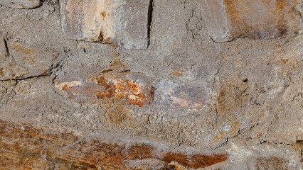 Texture of an old sandstone wall, wall attachment in the vineyards, textured background