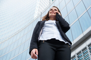 Business woman talking on her mobile cell phone