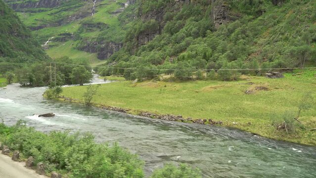 The Flam Railway one of the most beautiful train journeys in the world and is one of the leading tourist attractions in Norway. Driving plate. View through the window