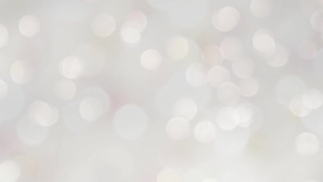 Bright bokeh light flares white abstract background.