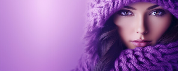 Woman Winter Cozy Chic: Stunning Female Model in Purple Hat, Scarf, and Coat - Captivating Close-Up of Her Eyes.