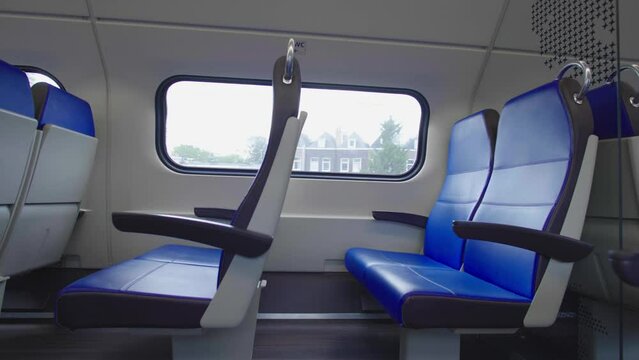 window of an empty carriage of a moving train