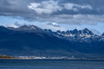 Puerto Williams in Chile, Tierra del Fuego, Patagonia, seen from the Beagle Channel with the Andes...