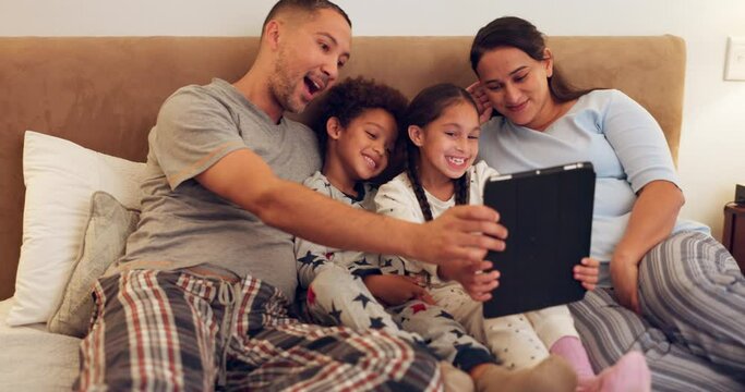 Tablet, bedroom or happy family take a selfie to relax on weekend holiday morning at home together. Parents, mom smiling or dad taking a photo or picture online on social media with children siblings