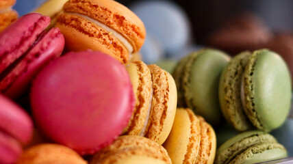 colorful macaroons on a wooden table