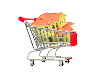 House in shopping cart as residential loan concept