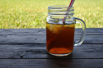 fresh iced tea served in a transparent glass