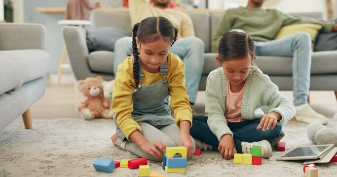 Kids, Toys And Floor With Men, Watching Tv Or Siblings For Learning, Games Or Together In Family House. Parents, Girl Children And Building Blocks On Carpet For Development, Playful Or Cheers On Sofa