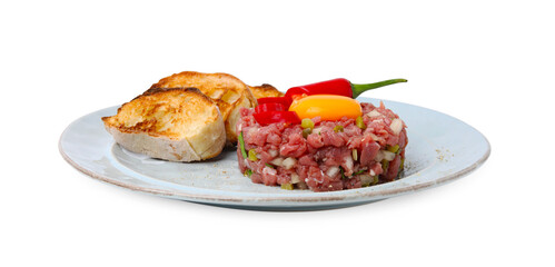 Tasty beef steak tartare served with yolk, toasted bread and other accompaniments isolated on white